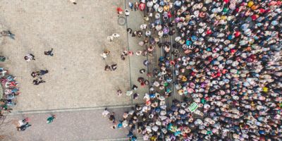Aerial view crowd of people green jobs / iStock